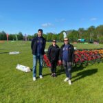 Harmony Energy staff standing at the cycling section of the Brownlee Foundation mini triathlon.