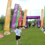 Children finishing a triathlon